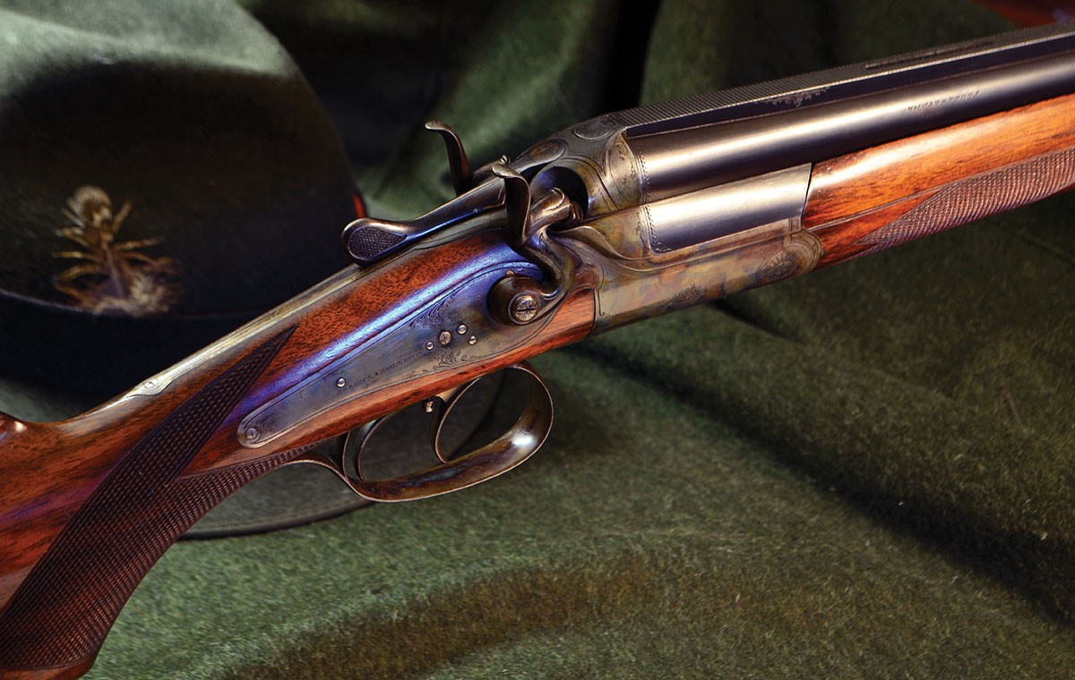 J.P. Sauer & Sohn Bockbüchsflinte (over/under combination gun) from 1913, chambered in 16-gauge and a mysterious 9mm cartridge. Over/under hammer guns are rare to the point of nonexistence. The back-action locks allow the frame to be gracefully rounded.